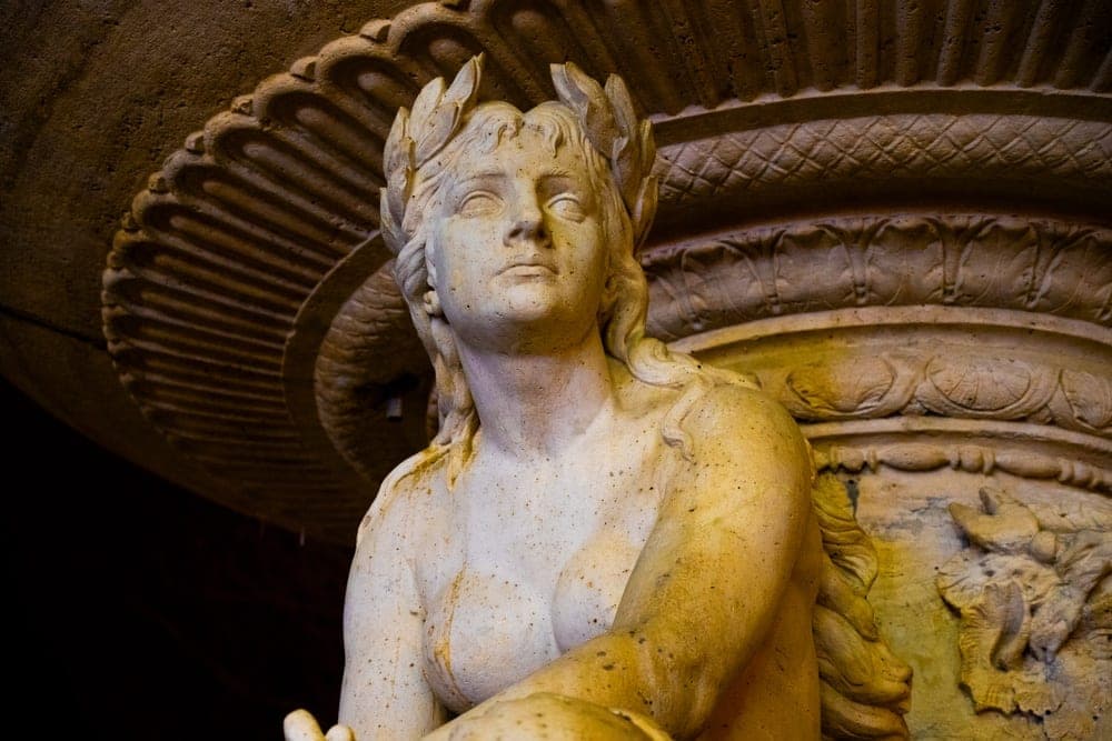 Marble statue of a laurel-crowned woman in Budapest, Hungary.