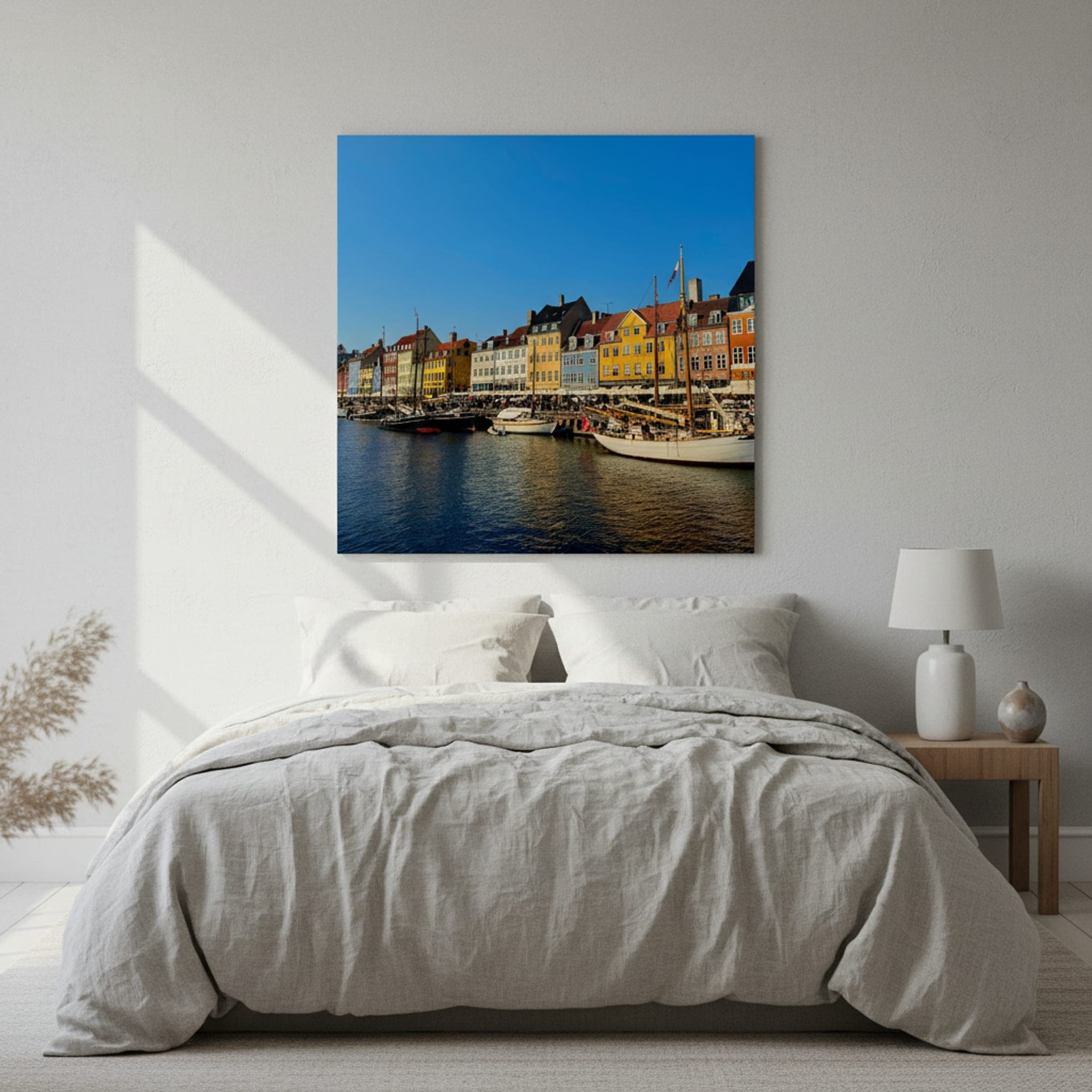 Nyhavn's Colourful Quays shown as a canvas print in a styled interior, view 1 of 3