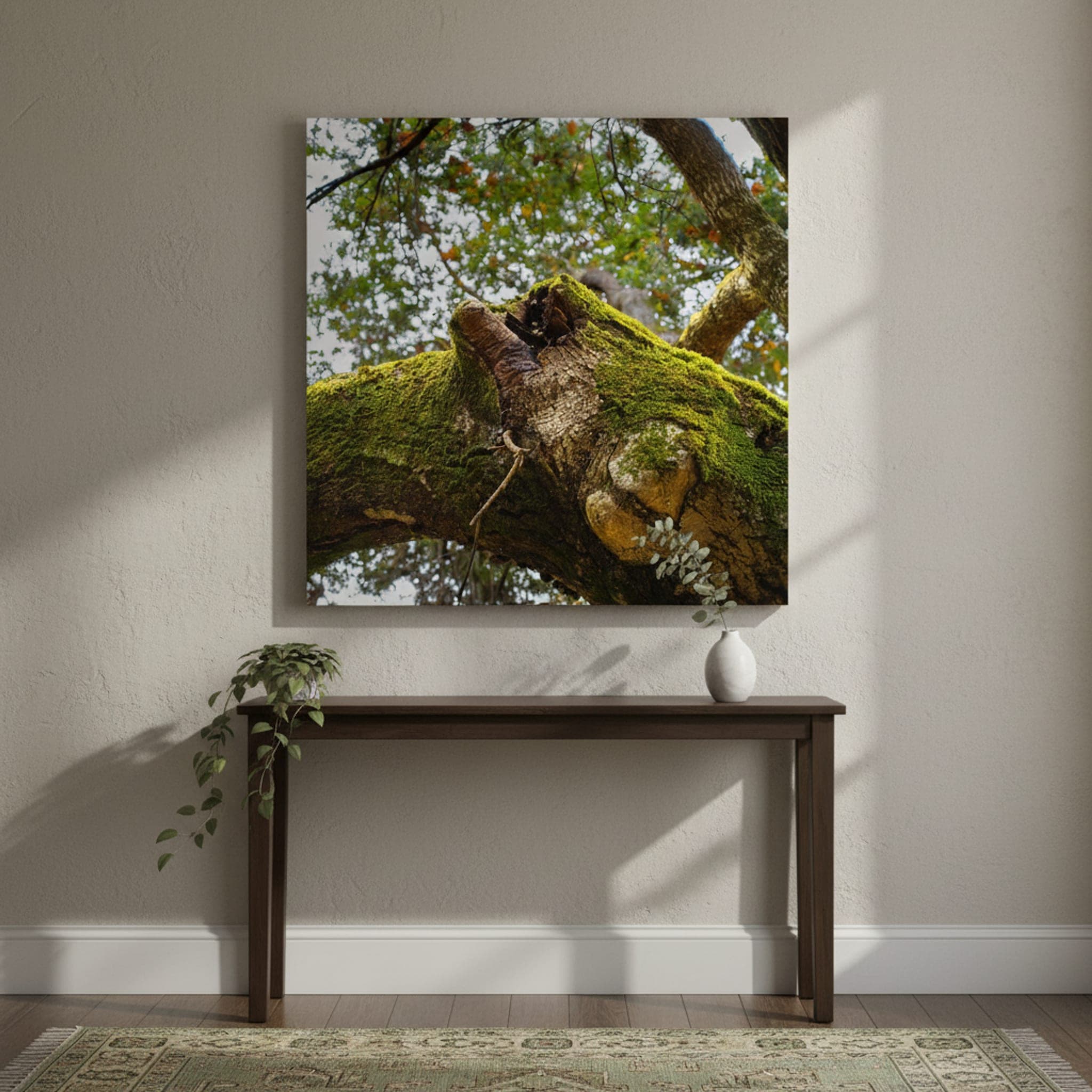 Moss-Kissed Branch shown as a canvas print in a styled interior, view 1 of 3